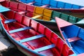 Four Rowboats Resting on a Lake in Nepal