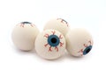 Four rubber toy eyeballs isolated on white