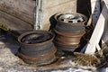 Four rusty wheels that thawed from the winter