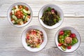 Four salad mix bowls healthy food Royalty Free Stock Photo