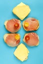 Four Sandwiches with ham and cheese on a blue background Royalty Free Stock Photo