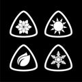 Four seasons icon set isolated on dark background Royalty Free Stock Photo