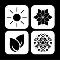 Four seasons web buttons or icons isolated on dark background Royalty Free Stock Photo