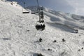 Four seats ski lift in Alps
