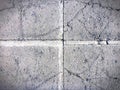 Four Sections of Cracked Cement Wall Background