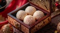 Four Sesame Balls in an Ornate Wooden Box Royalty Free Stock Photo