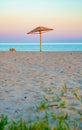 A four-sided umbrella from the sun on the beach made of natural materials Royalty Free Stock Photo