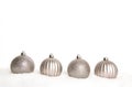Four silver Christmas decoration balls