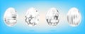 Four silver eggs on the sky blue background. Isolated objects for Easter. Star, dots and stripes ornate Royalty Free Stock Photo