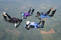 Four skydivers in freefall