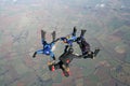 Four skydivers in freefall