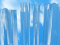 Four skyscrapers on a background of sky and clouds Royalty Free Stock Photo