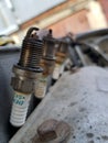 Four spark plugs Royalty Free Stock Photo