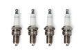 Four spark plugs. Top view. Royalty Free Stock Photo