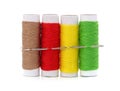 Four spools of thread and needle Royalty Free Stock Photo