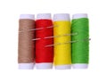 Four spools of thread and needles Royalty Free Stock Photo