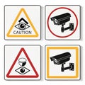 Four square security signs featuring caution surveillance camera and eye symbols on white background Royalty Free Stock Photo