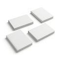 Four stacks of blank white paper arranged in a square formation Royalty Free Stock Photo