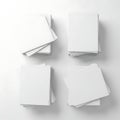 Four stacks of blank white paper on a light gray background Royalty Free Stock Photo