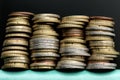 Four stacks of euro coins