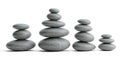 Four stacks of smooth, gray stones are arranged in a row. Each stack increases i Royalty Free Stock Photo