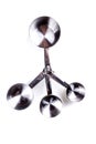 Four stainless steel measuring cups clipped together