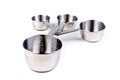 Four stainless steel measuring cups clipped together Royalty Free Stock Photo