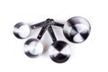 Four stainless steel measuring cups clipped together Royalty Free Stock Photo