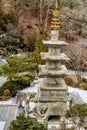 Four story stone carved pagoda at Buddhist temple