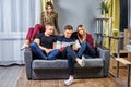 Four students in a college dorm room Royalty Free Stock Photo