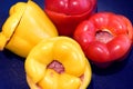 Four stuffed fresh bell peppers or capsicum