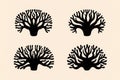 Four stylized black tree silhouettes with intricate branching patterns on a light background Royalty Free Stock Photo