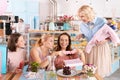 Four successful family women having fun discussing motherhood