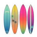 Four surfboards with different designs and colors arranged side by side on a white background Royalty Free Stock Photo