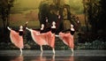 Four swans in ballet Swan Lake