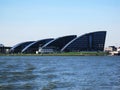 Four symmetric buildings