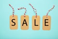 Four tags with the word sale on blue background