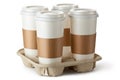 Four take-out coffee in holder Royalty Free Stock Photo