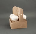 Four take-out coffee in holder Royalty Free Stock Photo