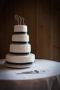 Four tiered wedding cake at a wedding reception Royalty Free Stock Photo