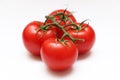 Four Tomatoes on a Vine Royalty Free Stock Photo