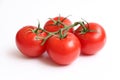 Four Tomatoes on a Vine 2 Royalty Free Stock Photo