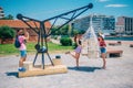 Four tourists fooling around while taking photos