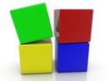 Four toy blocks of different colors are stacked in a cube Royalty Free Stock Photo
