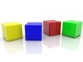 Four toy blocks on white in different colors Royalty Free Stock Photo