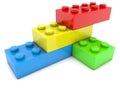 Four toy bricks of different colors are connected to each other Royalty Free Stock Photo