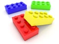 Four toy bricks of different colors on white Royalty Free Stock Photo