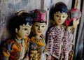 Four traditional Javanese Wayang Golek theatre puppets being sold as sourvenirs in Pawon, Java.