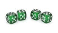 Four translucent green dice with white pips displayed on a clean white background Royalty Free Stock Photo