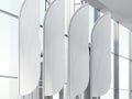 Four vertical wind banners in office. 3d rendering Royalty Free Stock Photo